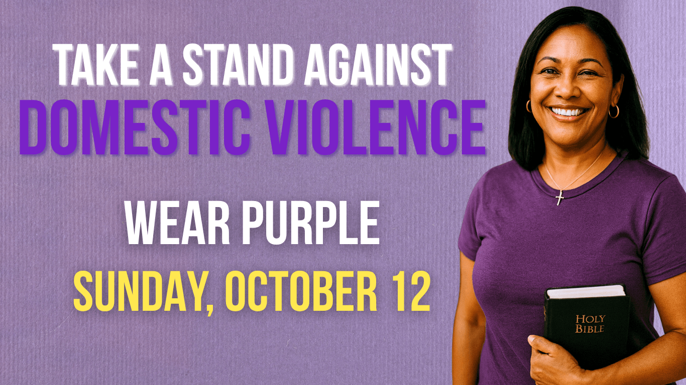 Woman wearing purple holding a Bible at Bethlehem United Methodist Church during Domestic Violence Awareness Month.