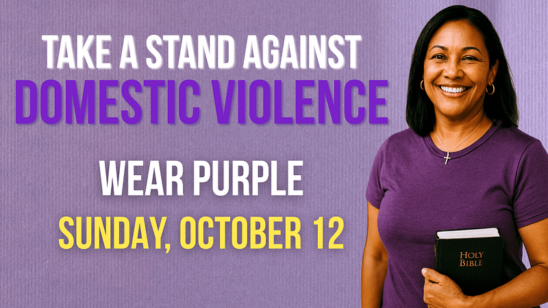 Woman wearing purple holding a Bible at Bethlehem United Methodist Church during Domestic Violence Awareness Month.